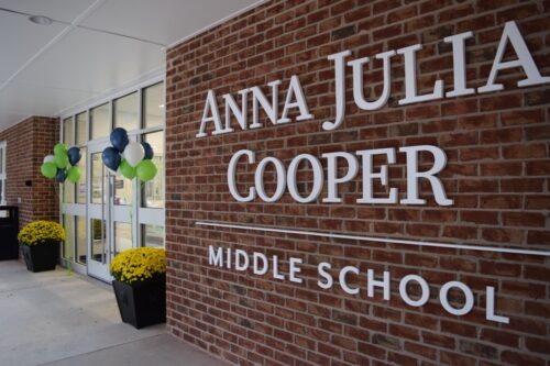 Signage on the outside of the middle school building during the first day at the new school.
