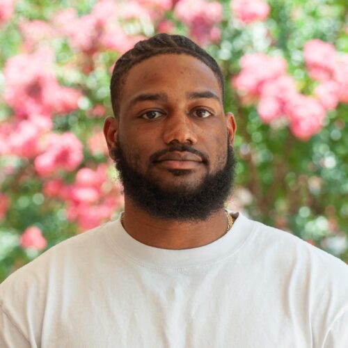 Headshot of Christian Reid.